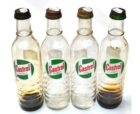 Four Vintage Castrol Motoroil Oil Bottles, with original lids, the verso printed Contents 1 quart, 34cm high