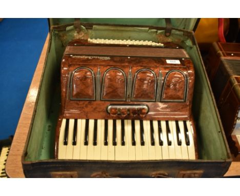 A vintage Victoria Castelfidardo piano accordion , in case