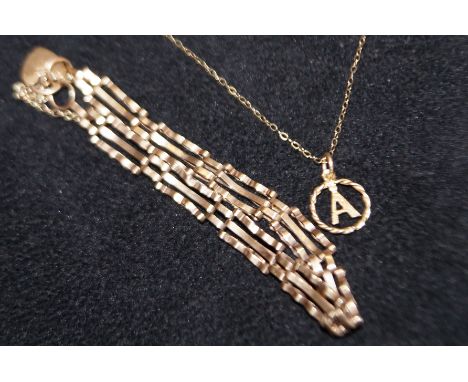 9ct Gold gate bracelet with heart locket together with a 9ct gold necklace &amp; pendant Total weight 6g