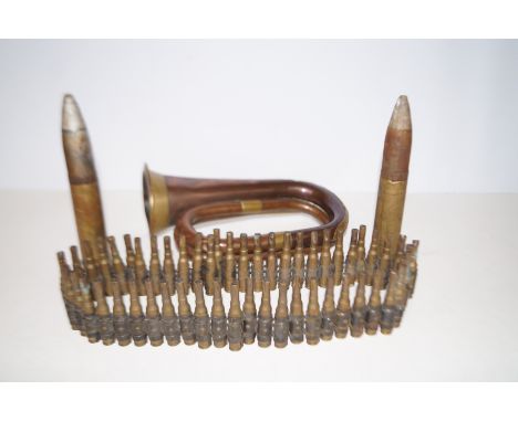 Bugle and a collection of shell casings