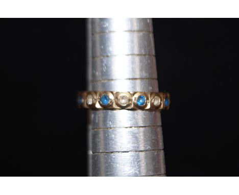9ct Gold Ring set with white and blue stones. Size K