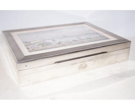 Good quality sterling silver, lined and engine turned cigar/cigarette box, glazed and hinged lid depicting Das Alster Bassin 