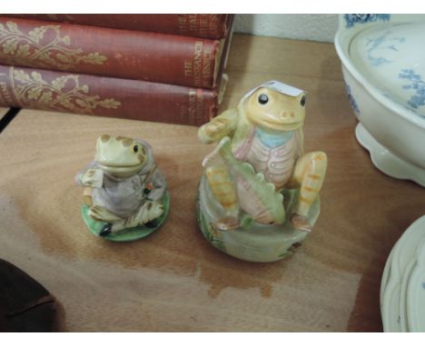 Two Beatrix Potter Jeremy Fisher figures one ceramic marked Royal Albert and one music box marked F.Warne