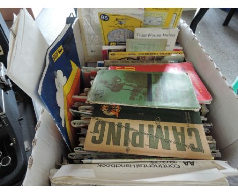 A box of vintage maps etc