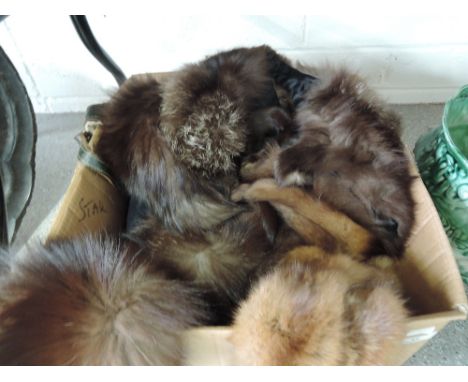 A selection of vintage mink, fox and other furs and throws.