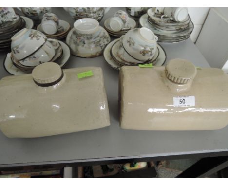 Two ceramic salt glazed bed warmers / hot water bottles
