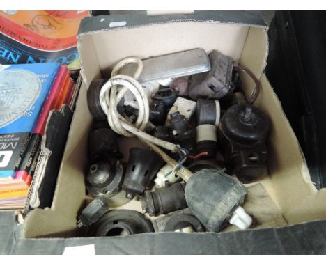 A box of vintage bakelite light fittings etc