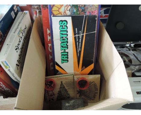 A box of vintage board games including ris, dominoes, Tri-tactics etc