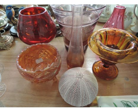 A selection of glassware including lustre glass, ruby glass and a pair of sea urchins etc