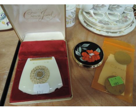 A Schick 'The Crown Jewel' electric ladyshave a Stratton compact with engine tooled back and floral enamel front and two 1977