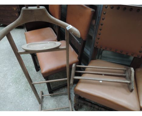 A vintage wooden valet and book rack
