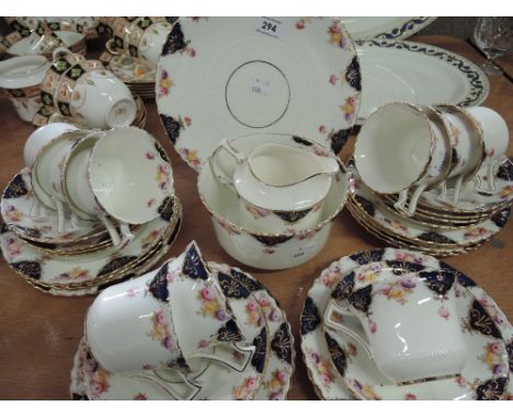 A Royal Albert part tea service in blue and gilt with floral design, approx 36 pieces