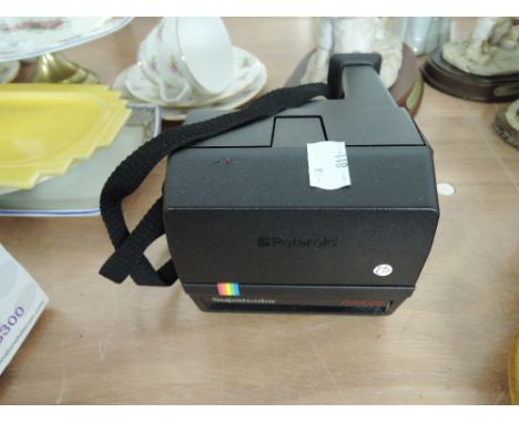 A vintage Polariod camera model no 635 CL with original box