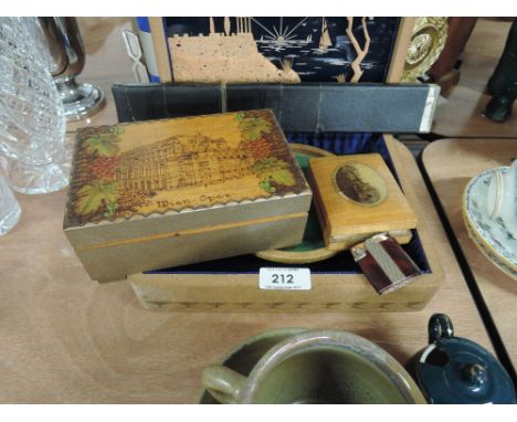 A selection of treen boxes including Mauchline ware box also vintage slide rule and lighter