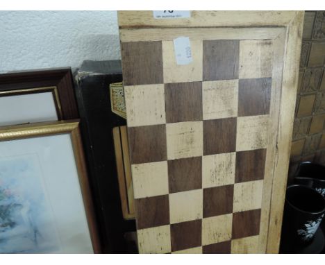 A carved treen draughts or chess playing board and other similar. 