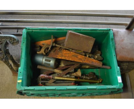 A green plastic box of tools 