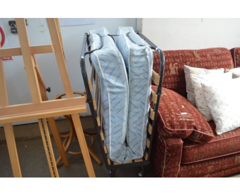 A folding Z bed