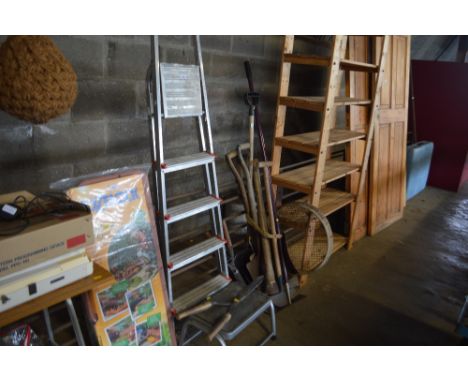 An aluminium step ladder together with a pair of hedge cutters and a small metal step