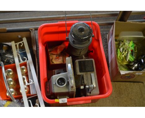 A box containing a Tilley lamp; a projector  AF etc. 