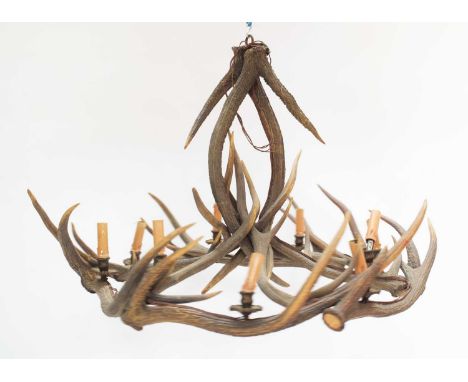 Antler Furniture: A Deer Antler Mounted Chandelier, mid-late 20th century, a large antler mounted nine-light chandelier, form