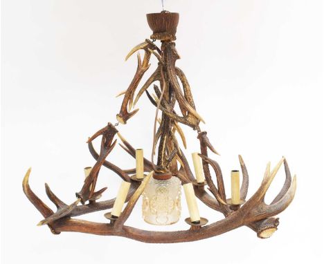Antler Furniture: An Antler Mounted Chandelier, late 20th century, a Red and Sika deer antler mounted seven-light chandelier,