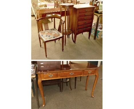  A Reproduction Mahogany Console Table with Three Drawers, 122cm by 41cm by 77cm , an early 20th mahogany music cabinet, an E