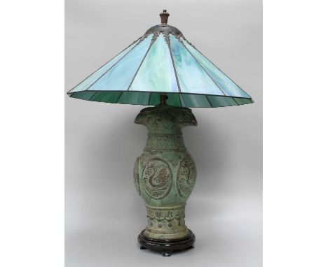 A Chinese Archaic Style Hu Shaped Vase Lamp, verdigris patination, with leaded glass shade