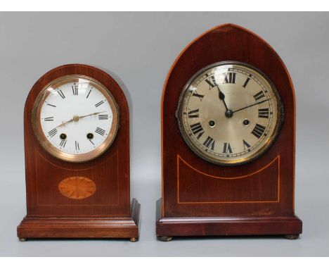 An Edwardian Mahogany Dome Topped Striking Mantel Clock, together with a similar lancet-form striking clock (2)