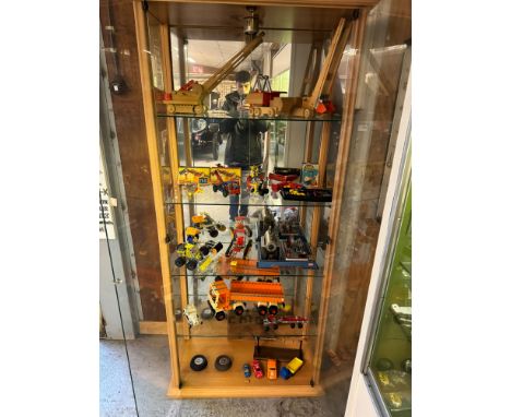 Wood and Glass Display Case with Automobilia Toys and Miniature Steam Engine. Dimensions (H x W x D): 185 x 90 x 42 cm. Condi