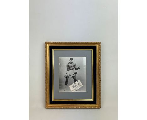 Framed and signed Mohammed Ali photograph with 1970 Heavyweight Championship ticket between Muhammed Ali and Jerry Quarry. Di