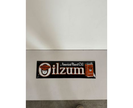 Oilzum "America's Finest Oil" enamel sign. Reproduction. Dimensions (H x W x D): 20 x 67 x 1 cm. Condition: Excellent. Locati