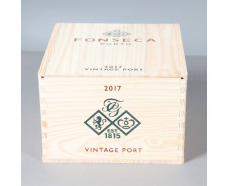 A set of 6 bottles of Fonseca Porto Vintage Port, 750ml bottles and in a wooden case with sliding lid. Case 31cms by 28cms *P