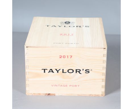 A set of six bottles of Taylor's Vintage Port 2017, 750ml and in a wooden case with sliding lid. Box 32cms by 28cms *Part of 