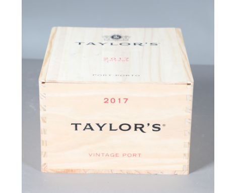 A set of six bottles of Taylor's Vintage Port 2017, 750ml and in a wooden case with sliding lid. Box 32cms by 28cms *Part of 
