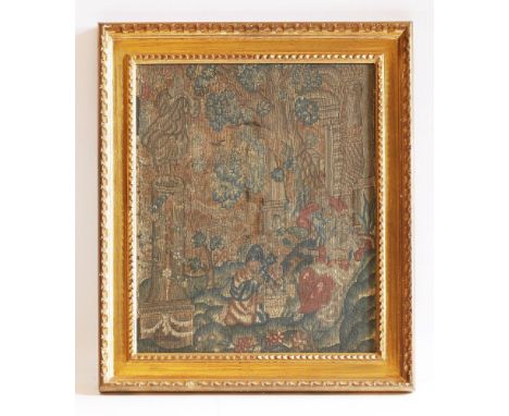 A tapestry fragment,probably 16th century, depicting seated and kneeling figures in a formal wooded landscape,48cm wide56cm h