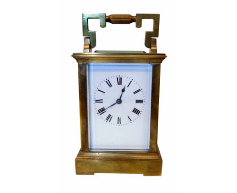 Late 19th century carriage clock, brass frame containing five bevelled glass panels, 8-day movement striking on single gong, 