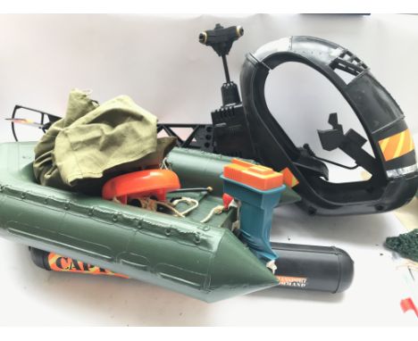 A Vintage Action Man Coper ( Parts Missing) and a Dingy with motor.