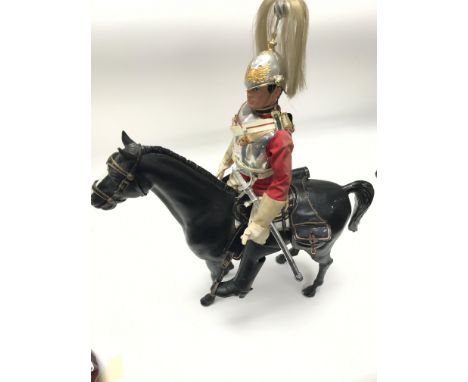 A Vintage Mounted Action Man in The Life Guards Uniform.