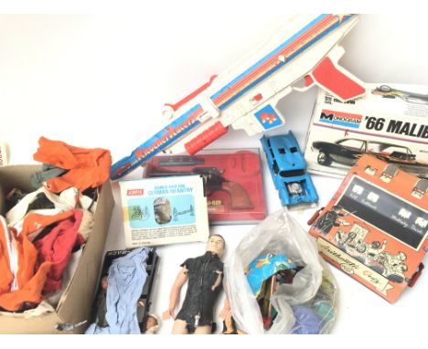 A Box Containing Various Toys/ parts etc including a Tin Plate Quiz. Action Man Accessories. Die-cast Toys Etc.