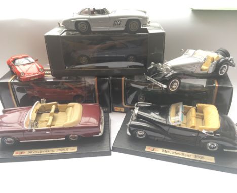 4 x Maisto Vehicles (2 Boxed) scale 1:18 and 4 others.