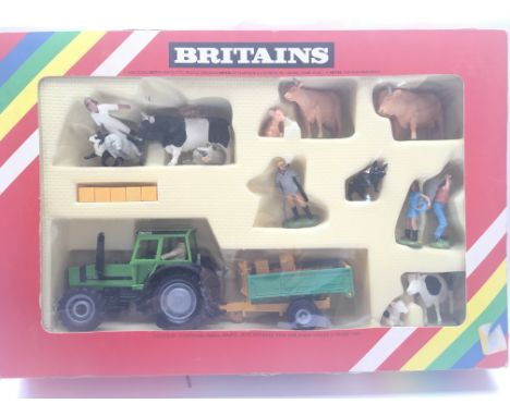 A boxed Britain’s Deutz Tractor and Farm Implements #9589.