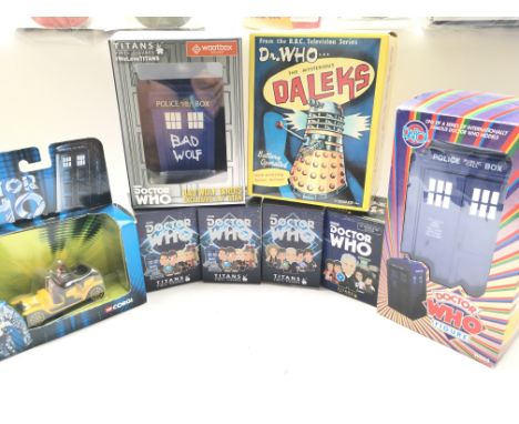 A Collection of boxed Doctor Who Titan Figures. A Boxed Corgi Bessie #TY96101. A Titans Bad Wolf Tardis. Etc.