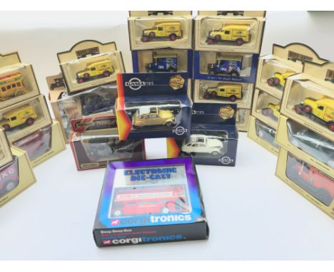 A Box Containing a Collection of Lledo Days Gone. Gama. Corgi etc.