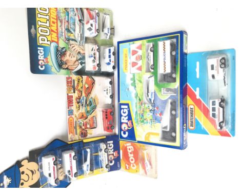 A Matchbox 75 Two Pack. A Corgi Police in Action Set. A Corgi Police set #92385. A Corgi Police Set #J3177. A Corgi Helicopte