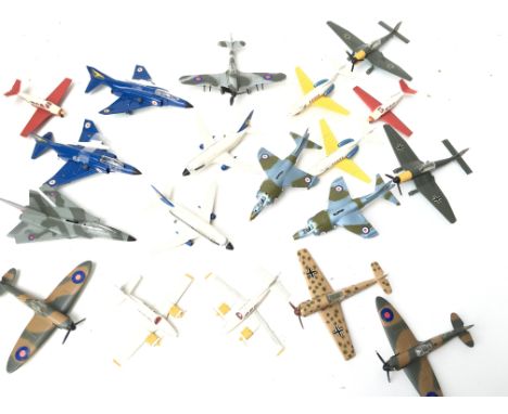 A Collection of Dinky Aircraft including Spitfire. Messerschmitt. Harriers and others.