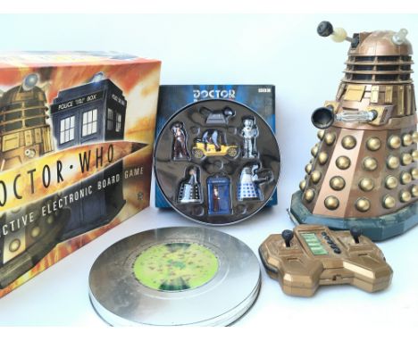 A Collection of Doctor Who Toys including A R/C Dalek. A Corgi 1963-2003 set and. interactive Electronic Board Game.