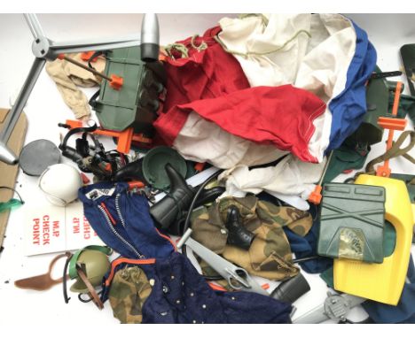 A Collection of Action Man Uniform.Guns.Boots and 2 Turbo copters.