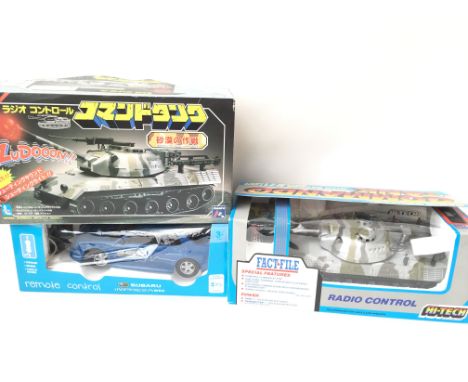 2 X Radio Controlled Command Tanks &amp; A R/C Subaru Car. Boxed.