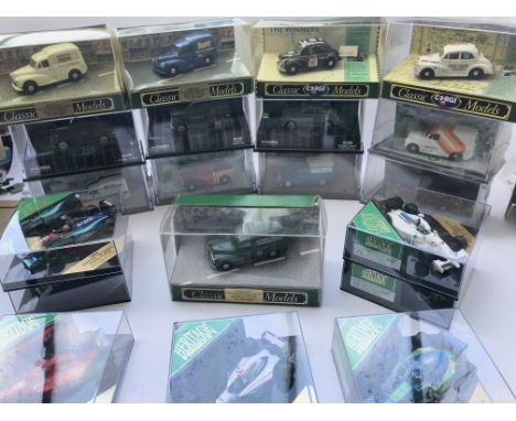A Collection of Corgi Classic Morris Minors and a Collection of Heritage Formula 1 Cars. All boxed.
