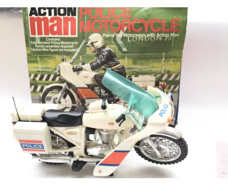A Boxed Palitoy Action man Police Motorcycle.